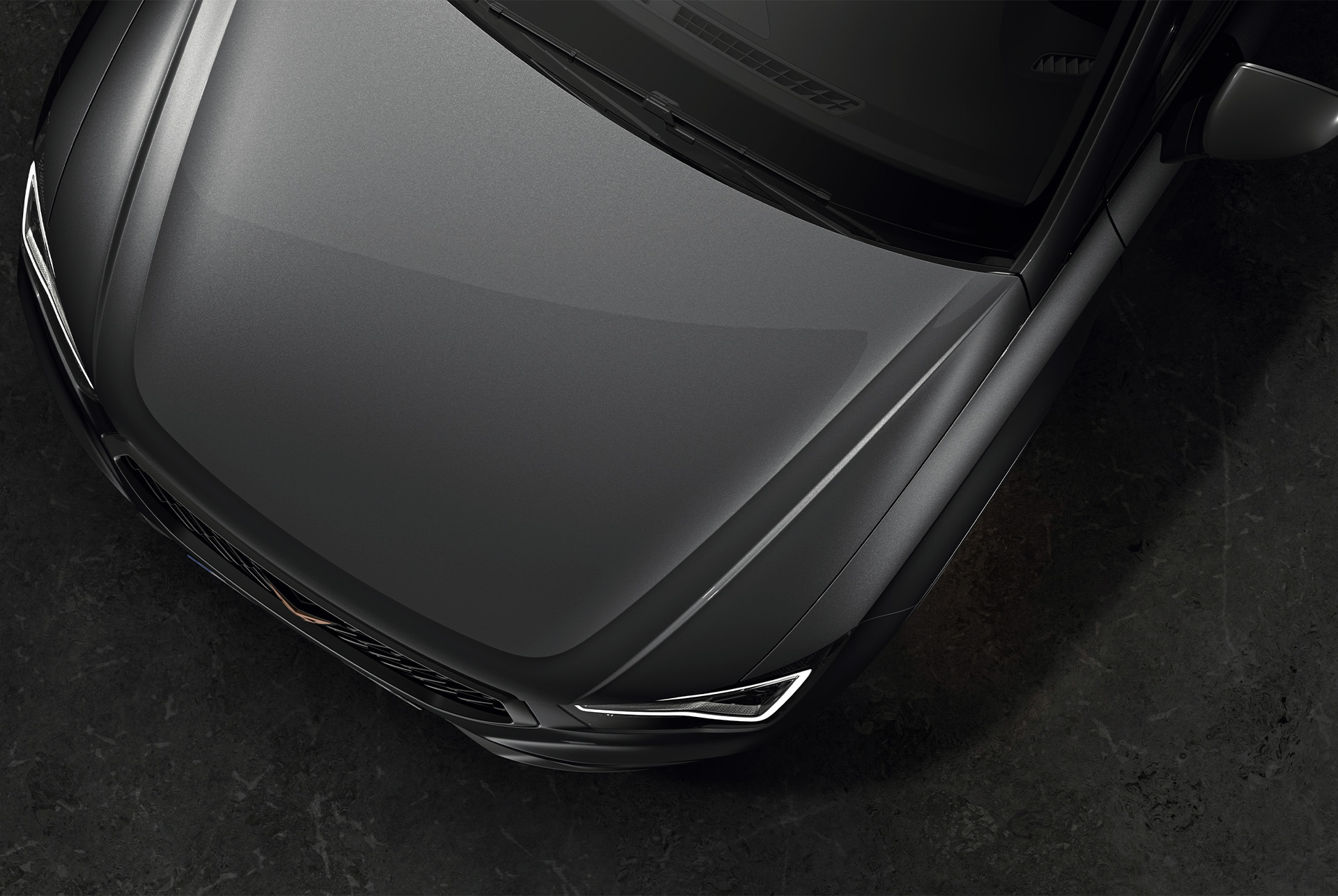 Draufsicht des CUPRA Ateca in Graphite Grau, die die elegante und raffinierte Oberfläche des Fahrzeugs zeigt.